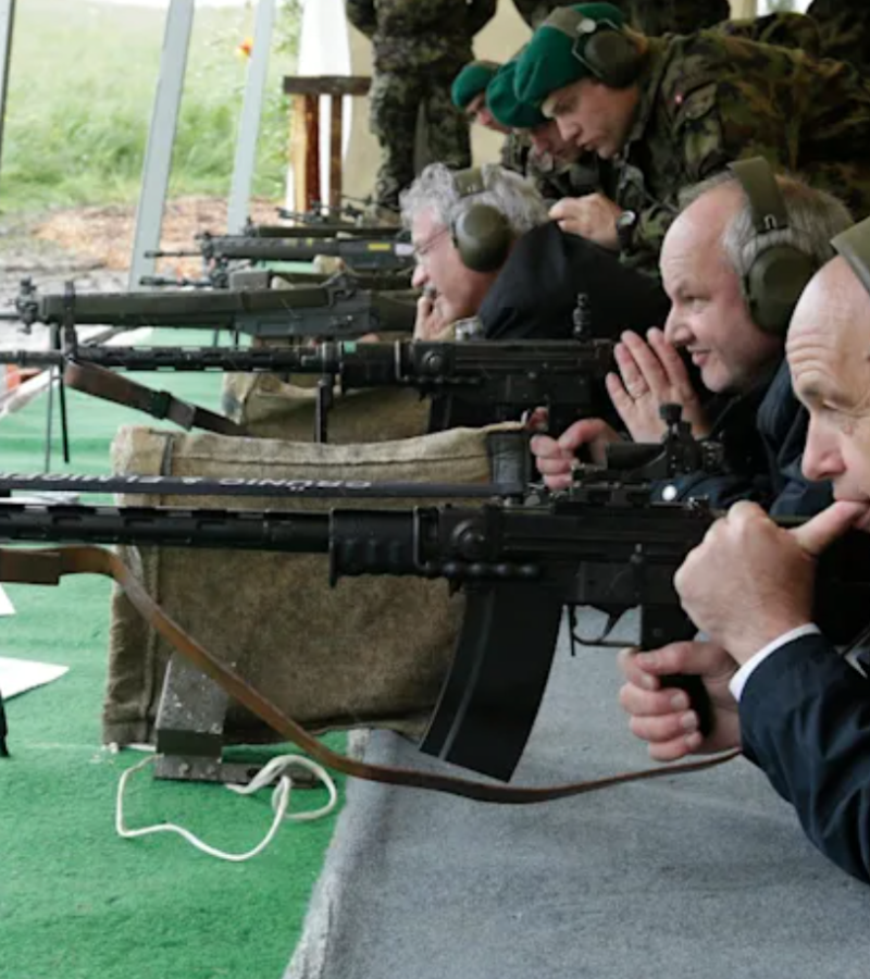 Swiss President Ueli Maurer pauses during a shooting-skills exercise — a several-hundred-year-old tradition — with the Foreign Diplomatic Corps in Switzerland on May 31, 2013.REUTERS/Denis Balibouse