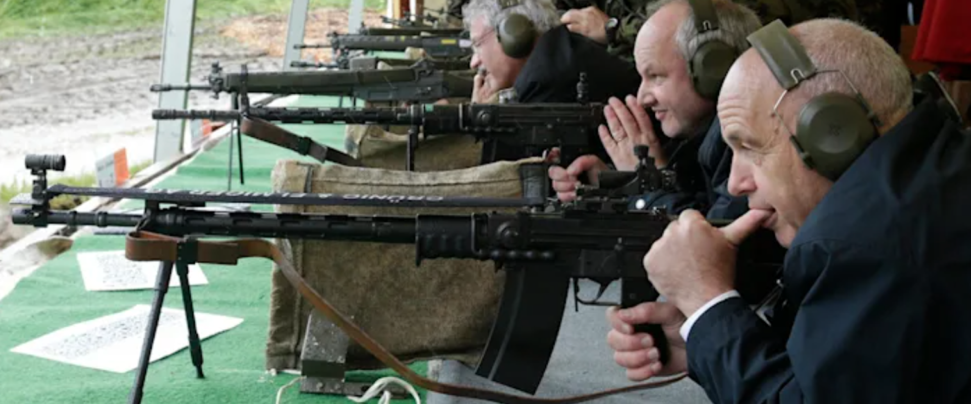 Swiss President Ueli Maurer pauses during a shooting-skills exercise — a several-hundred-year-old tradition — with the Foreign Diplomatic Corps in Switzerland on May 31, 2013.REUTERS/Denis Balibouse